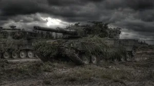 Tank With Ghillie Cover Wallpaper