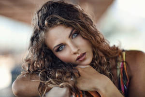 Tanned Woman With Curly Hair Wallpaper