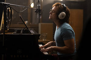 Taron Egerton Rocketman Piano Recording Wallpaper