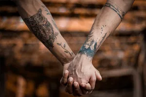 Tattooed Couple Hands Wallpaper