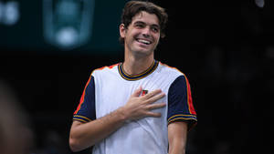 Taylor Fritz In Multi-colored Shirt Wallpaper