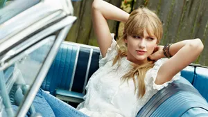Taylor Swift Sits Comfortably In Car Wallpaper