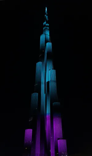 Teal And Violet Colors On Burj Khalifa Wallpaper
