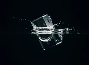 Technology Sinking Digital Camera Wallpaper