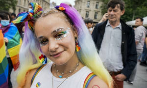 Teenage Girl With Rainbow Hair And Glitter Eyes Wallpaper