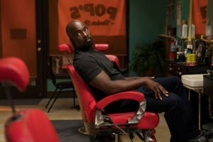 Television Show Luke Cage In A Barbershop Scene Wallpaper