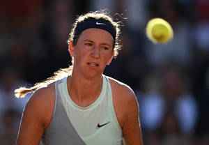 Tennis Ball Flying Towards Victoria Azarenka Wallpaper