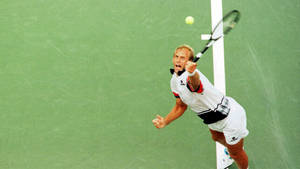 Tennis Legend Thomas Muster In Action Wallpaper