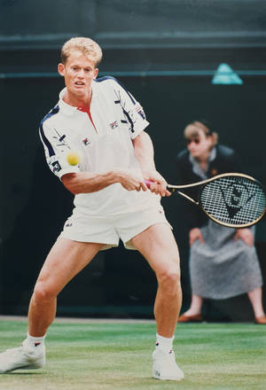 Tennis Legend Wayne Ferreira Executing A Backhand Stroke Wallpaper