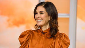 Teri Hatcher, Renowned American Actress In An Intimate Interview Moment Wallpaper