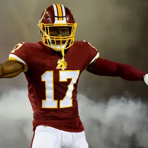 Terry Mclaurin Football Player Washington Commanders Action Wallpaper