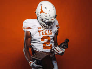 Texas Football Holding Trophy Wallpaper