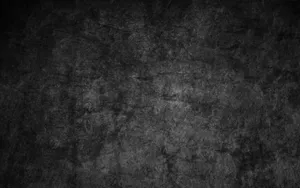 Textured Black Stone Wall Desktop Wallpaper