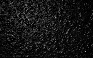 Textured Black Surface Abstract Wallpaper