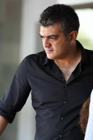 Thala Ajith In The High-octane Blockbuster Film Arrambam Wallpaper