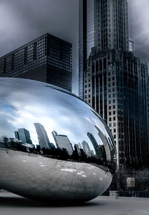 The Bean In Chicago Reflecting Surrounding Buildings. Wallpaper