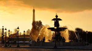The Beauty Of The City Of Paris At Dusk, As Illuminated By The Sunset Over Place De La Concorde. Wallpaper