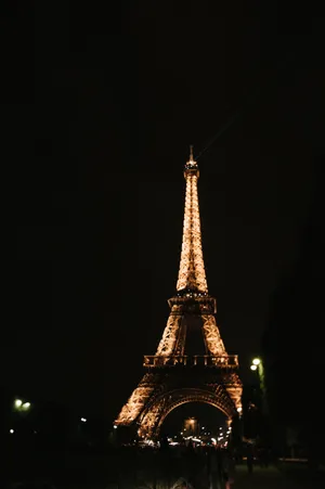 The City Of Lights Glows At Night Wallpaper