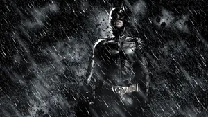 The Dark Knight Stands At The Center Of A Post-apocalyptic Landscape Wallpaper