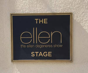 The Ellen Show Sign On A Wall Wallpaper