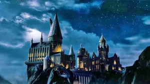 The Enchanting Grandeur Of Hogwarts Castle Wallpaper