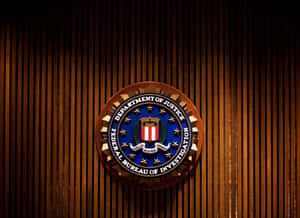 The Fbi Logo Is On A Wooden Wall Wallpaper