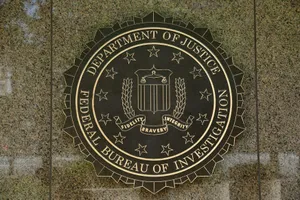 The Fbi Logo Is On The Wall Of A Building Wallpaper