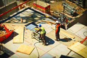 The Foreman Tells A Construction Worker The Instructions Wallpaper