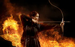 The Hunger Games Katniss With Bow Wallpaper