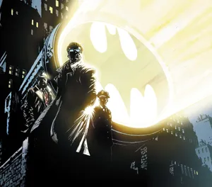 The Iconic Bat Signal Illuminating The Night Sky Wallpaper