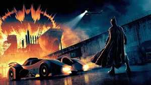 The Iconic Bat Signal Lighting Up The Night Sky Wallpaper