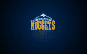 The Iconic Denver Nuggets Logo Bathed In Dark Blue Wallpaper