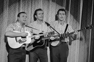 The Kingston Trio Performing At The Jack Benny Program Wallpaper