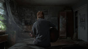 The Last Of Us 2 Guy Playing Guitar Wallpaper