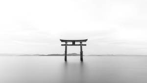 The Majestic Torii Gate In Japan In Grayscale Photo Wallpaper