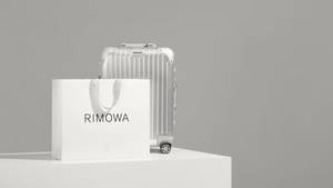 The Sophisticated Silver Rimowa Suitcase Wallpaper