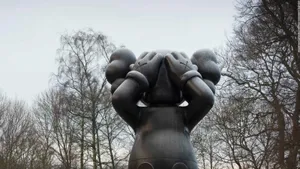 The Subtle Reflections Of Kaws Artwork Wallpaper