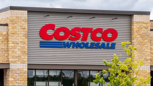 The Vibrant Exterior Of A Costco Wholesale Store Showcasing A Variety Of Plants. Wallpaper