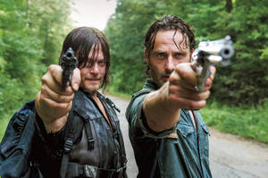 The Walking Dead Aimed Revolvers Wallpaper