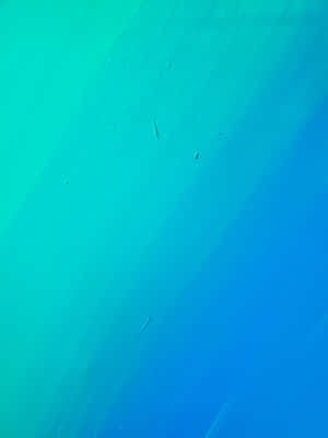 This Bright Turquoise Iphone Looks Great In The Sunshine! Wallpaper