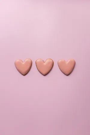 Three Pastel Pink Heart Sugar Cookies Wallpaper