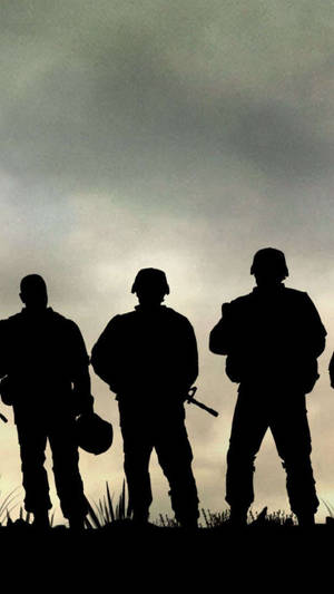 Three Soldiers Ready For Shooting Wallpaper