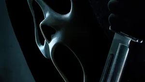 Thrilling Depiction Of Ghostface From The Scream Franchise Wallpaper