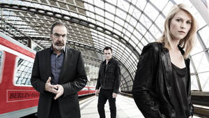 Thrilling Journey - Homeland Tv Series Scene In Berlin-hamburg Train Wallpaper