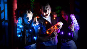 Thrills And Spills In Laser Tag Adventure Wallpaper