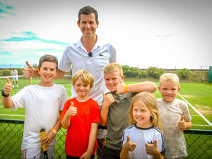 Tim Henman Posing With Kids Wallpaper