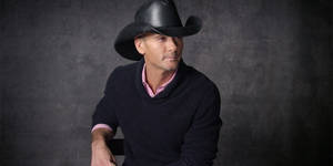 Tim Mcgraw Cowboy Hat Limewash Wall Wallpaper