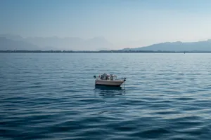 Tiny White Boat Wallpaper