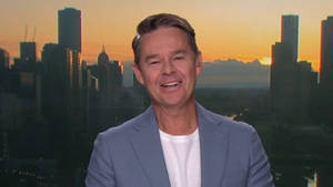 Todd Woodbridge Offering Commentary On Television Wallpaper