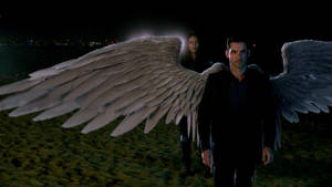 Tom Ellis As Lucifer Devil Showing His Wings Wallpaper